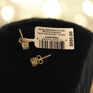 Gold and Diamond stud earrings.